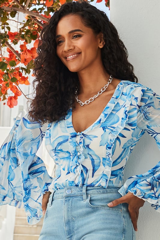 If in doubt, nice top
Crafted from the prettiest chiffon fabric
Voluminous fluted sleeves for a gorgeous silhouette
Ruffle trims amplify the dreaminess
Cut to pair perfectly with jeans or linen trousers
We love it with white denim and a raffia bag
