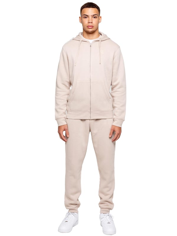 Elevate your everyday look with the Kruze Men’s Tracksuit Set, a perfect blend of comfort, warmth, and style. This set includes a regular-fit zip-up hoodie and matching joggers, both crafted with a cozy brushed-back inner fleece for a soft feel and added insulation on cooler days. The hoodie features an adjustable drawstring hood, ribbed cuffs and hem for a secure fit, and Kruze’s rubber-printed branding on the chest for a touch of signature style. Two convenient side pockets offer space for your essentials. Paired with regular-fit joggers, this tracksuit ensures all-day comfort and a sleek look. The joggers come with a ribbed waistband and adjustable drawstring for a tailored fit, two side pockets for practicality, and ribbed ankles for a streamlined, modern silhouette. A Kruze rubber print on the leg adds subtle branding.