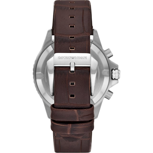 This Emporio Armani Diver Chronograph Watch for Men is the perfect timepiece to wear or to gift. It's Silver 43 mm Round case combined with the comfortable Brown Leather watch band will ensure you enjoy this stunning timepiece without any compromise. Operated by a high quality Quartz movement and water resistant to 10 bars, your watch will keep ticking. This Elegant and practical watch is perfect for all occasions. It’s a great gift for your relatives and friends -The watch has a calendar function:  Date , Stop Watch , 24-hour Display , Luminous Hands and Luminous Numbers High quality 21 cm length and 22 mm width Brown Leather strap with a Buckle Case diameter: 43 mm,case thickness: 12 mm, case colour: Silver and dial colour: Brown