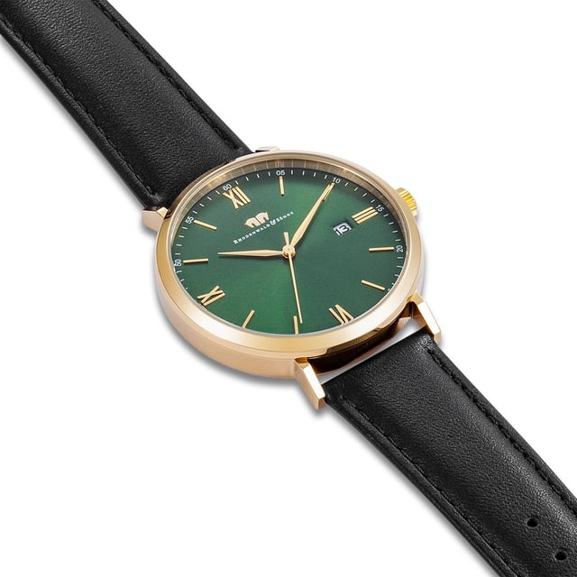 Elegant purism in the style of traditional watchmaking art: This men's watch of the Rhodenwald & Sons manufacture is an accessory for men with high demands on design and functionality. The puristic dial comes out with a few design elements and is reduced to filigree Roman digits and line indices, a minute and date display. The robust stainless steel case is refined with yellow gold and forms a warm shimmering frame for the dial - a highlight on every wrist. The real leather strap with color -coordinated seam ensures the best wearing comfort.