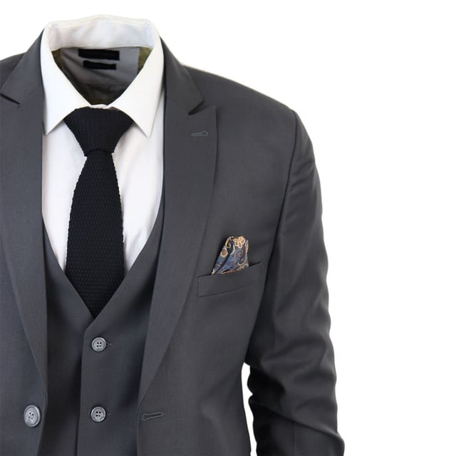 Indulge in Classic and Elegant Design with this men's 3-piece suit, featuring a timeless Charcoal color ideal for formal occasions. Product Design Bullet Points:  
Versatile Formal Attire: Suitable for weddings, business events, or special occasions, ensuring a sharp and well-dressed look.
 
Complete 3-Piece Set: Includes a jacket, vest, and trousers for a polished and coordinated outfit.
 
Premium Material: Crafted from high-quality materials for comfort and durability.
 
Tailored Fit: Offers a tailored fit that complements your body shape, enhancing your appearance and confidence.
 
Timeless Charcoal Color: Perfect for a classic and sophisticated look, suitable for various formal settings.  Made from a blend of 65% Polyester and 35% Viscose for a comfortable and stylish finishSizes	Jacket & Trouser Size
36R :	36" (Chest) 30" (Waist)
38R :	38" (Chest) 32" (Waist)
40R :	40" (Chest) 34" (Waist)
42R : 	42" (Chest) 36" (Waist)
44R :	44" (Chest) 38" (Waist)
46R : 	46" (Chest) 40" (Waist)
48R :	48" (Chest) 42" (Waist)
50R :	50" (Chest) 44" (Waist)
52R :	52" (Chest) 46" (Waist)
54R :	54" (Chest) 48" (Waist)