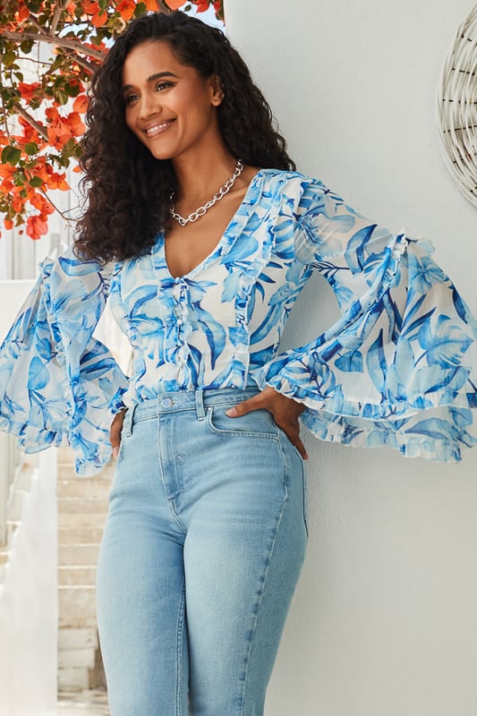 If in doubt, nice top
Crafted from the prettiest chiffon fabric
Voluminous fluted sleeves for a gorgeous silhouette
Ruffle trims amplify the dreaminess
Cut to pair perfectly with jeans or linen trousers
We love it with white denim and a raffia bag