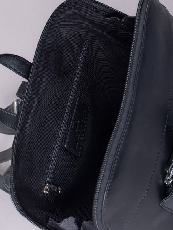 The Talkin handbag collection is a study in sleek sophistication, and this practical backpack is no exception. Crafted from soft premium leather, this classic design has plenty of space to ensure you can carry all your essentials with ease. The adjustable leather straps offer unparalleled comfort, and we've included a grab handle for convenient carrying.
