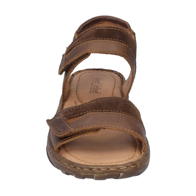 Mit der Debra 19 Sandale von JOSEF SEIBEL, in der Farbe castagne/kombi, erlebst du den Sommer von seiner besten Seite. Dieser Damenschuh vereint traditionelle Handnaht mit modernem Design und bietet durch die PU-Sohle außergewöhnliche Dämpfeigenschaften, die jeden Schritt leicht machen. Das Obermaterial sowie das Fußbett aus Leder garantieren ein angenehmes Tragegefühl und machen die Sandale zum idealen Begleiter für jegliche Freizeitaktivitäten im Freien. Dank des praktischen Klettverschlusses lässt sie sich schnell an- und ausziehen. Die Debra 19 ist ein Paradebeispiel für Slow Fashion, geprägt von der Spirit of Nature Kollektion, die für ihren charakterstarken Designansatz und den hohen Tragekomfort steht. Entdecke, wie dieser Schuh mit seiner einzigartigen Fertigungsart echte deutsche Industriekultur verkörpert und setze ein Statement gegen Fast Fashion.