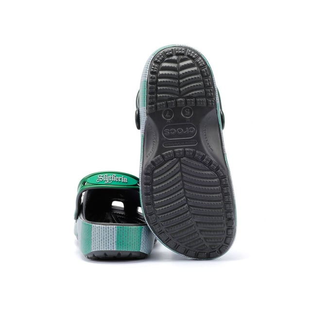 Inspired by Harry Potter’s Slytherin House scarf in green and grey, these Classic Clogs are lightweight, water-friendly, and buoyant. Featuring breathable ventilation ports and pivoting heel straps for a secure fit, they're perfect for fans seeking style and comfort. Customisable exclusive Slytherin-inspired Jibbitz™ charms.