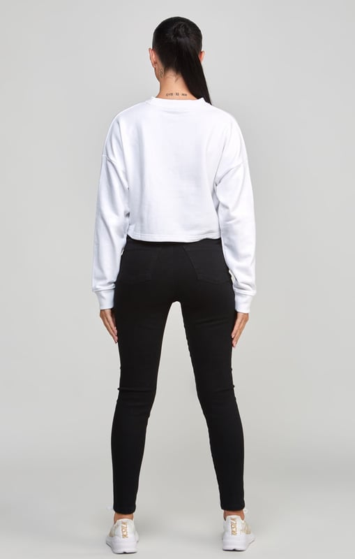 inchWhite Crop Varsity SweatshirtSoft touch fabricCropped fitEmbroidered logoCrew neckAppliqueLong sleeveMachine wash80% Cotton 20% Polyester Loopback inch