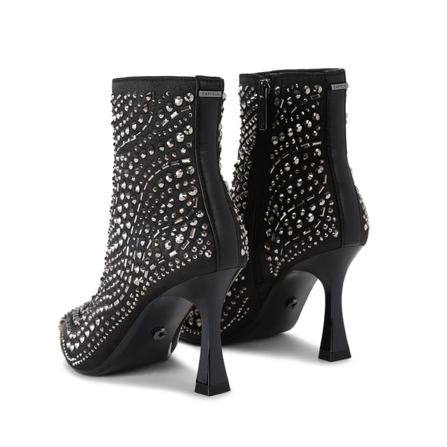 The Carvela Catwalk ankle boot features a black satin upper with gunmetal studs across the upper. The heel is in a flared design. Heel height: 8.5cm.