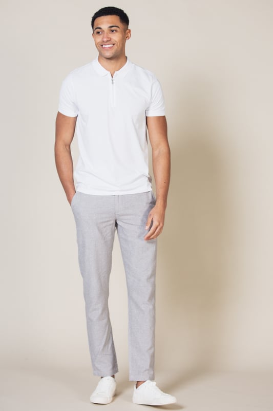 These classic-style fleece trousers from Nines by Kensington Eastside are wardrobe staples. Designed in a classic fit, these trousers feature belt loops and two side pockets for added convenience. Made from pique fleece blend fabric to ensure comfort and easy care.