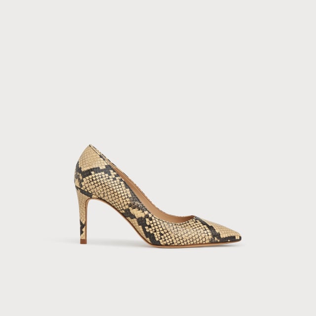 Our Floret courts are sleek and stylish. Crafted in Spain from snake print yellow leather, this L.K.Bennett signature style has a pointed toe, single sole and a slender, 85mm stiletto heel. Perfect day or night, wear Floret with shift dresses or tailored trousers in the office and with something softer and lighter for the evenings and summer occasions.