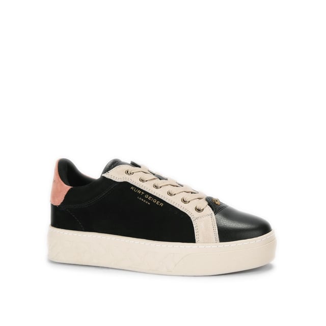 The Kensington Cupsole sneaker features a black suede leather upper with grey and pink panels. The front laces up with antiqued eagle head at the base of the laces. The sole is quilted in rubber.