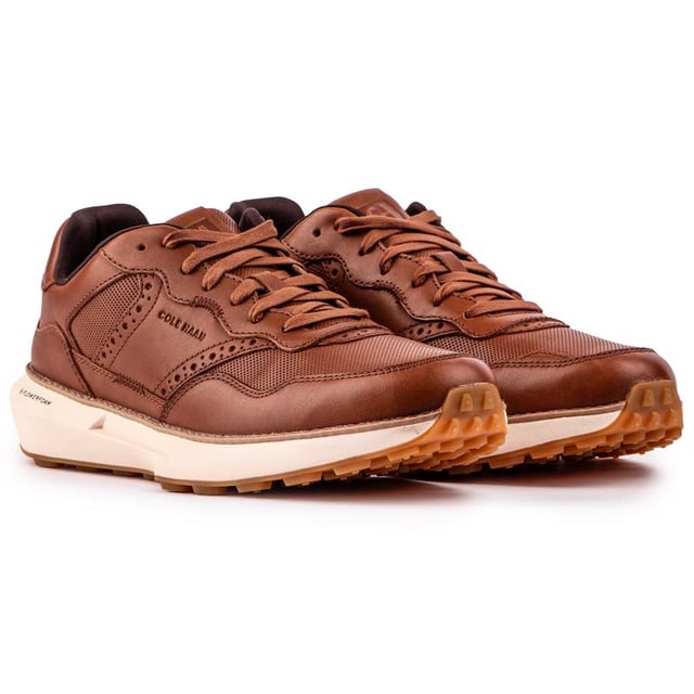 Descubra las nuevas zapatillas GrandPrø Ashland de Cole Haan, donde la ingeniería de precisión dentro de los detalles hechos a mano crea el equilibrio perfecto entre el estilo clásico de correr y el diseño brogue con la innovación de Cole Haan. Luce bien y siéntete bien con este versátil. De inspiración deportiva retro. Una zapatilla elegante para todo el día se combina con un zapato de vestir.