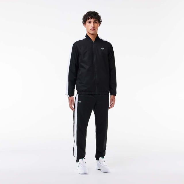 Designed for Tennis  for a regular frequency of use This poduct is made with our iconic diamond weave Taffetas. This hard-wearing fabric lends Lacoste’s tracksuits and caps a solid criss-crossed weave. Designed for freedom of movement  it is supple and lightweight  dries very quickly and doesn’t crease. This tracksuit is in 100% recycled polyester The jacket has a mesh lining and the pant a jersey lining Regular fit: natural ease on body The French Capsule offers the complete mid seasonal wardrobe on and off court with a powerful colorblocking design and its new print.