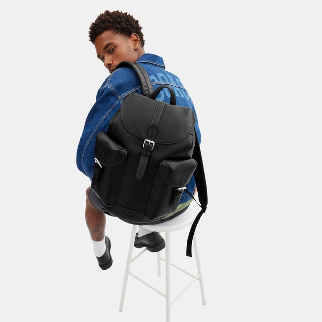 Warner Backpack in Pebbled Leather, Inside zip and multifunction pockets
 Inside laptop sleeve, Outside snap pockets,  Length: 31.50 cm,  Width: 17.50 cm,  Height: 43.00 cm