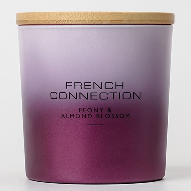This Beautiful French Connection Candle is the perfect home décor piece to make a statement in your home this festive season.

The Ombre look finished container finished in Pink is right on trend this season. The candle fill is beautifully scented with Peony & Almond Blossom which will fill your room with a beautiful aroma.
