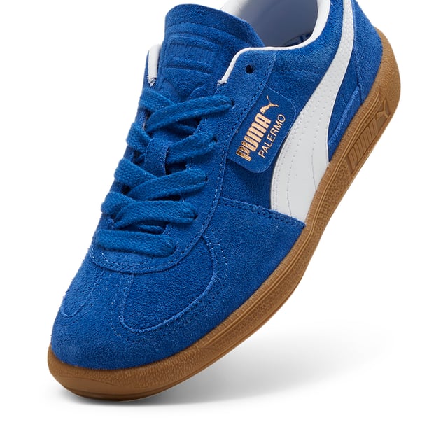 PRODUCT STORY A terrace legend from our archives returns: The Palermo. The silhouette debuted back in the early '80s, where it quickly became a staple among the terrace crowds in British football stadiums. Now, we’ve brought it back for the fans. Like the original, the Palermo is complete with its signature tag at the upper, a T-toe construction, and, of course, the classic gum sole. FEATURES & BENEFITS PUMA’s leather products support responsible manufacturing via the Leather Working Group. DETAILS Leather upperSynthetic liningDebossed and foil-printed PUMA branding on quarter panel tab and heel capLeather-coated FormstripRubber midsoleRubber outsolePUMA Youth: Recommended for older kids between 8 and 16 years