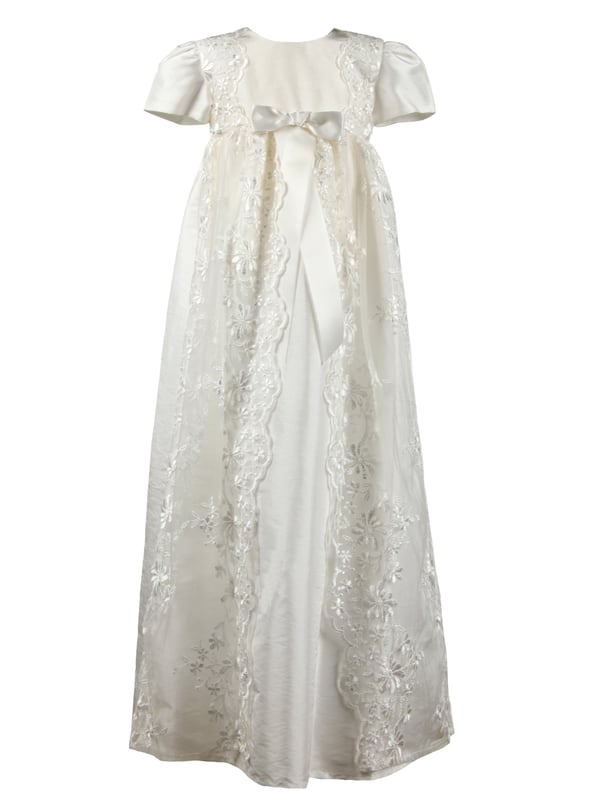 Fairly new to our traditional gown collection is style HARMONY Christening robe.  Suitable for baby girls or boys, this would make a beautiful heirloom. 
 
This long christening robe is made from our popular Mock Silk, easy for spot cleaning when your little one has that inevitable milk burp. We've all been there...
It has short sleeves and beautiful lace details on the body running down the full length of the skirt. 
We've added some lace detailing to the back as well. Don't forget when you hold your baby towards you, the back of the dress will be seen by everyone. It's always good to have some interesting details on the back. The opening is a concealed zip fastening.
We've complimented this gown with a matching bonnet that ties at the neck. Traditional and classic throughout.
 
We always line our dresses and robes in 100% lightweight Cotton fabric which is cool and better against babies body, especially if they have sensitive skin
 
The outfit arrives to you on a Satin padded hanger and protected by one of our Heritage keepsake garment bags.
 
Outer - 100% Polyester Mock Silk - Ivory
Lining - 100% Cotton
Dry Clean or Hand Wash
