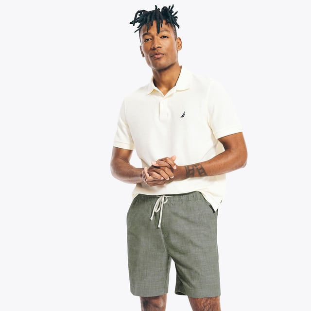 Your 'go to' summer shorts featuring a comfortable elastic-drawstring waist Multiple pockets to keep your necessities close and secure. Nautica logo embroidered above back welt pocket Fit: Relaxed, Sizing: As expected