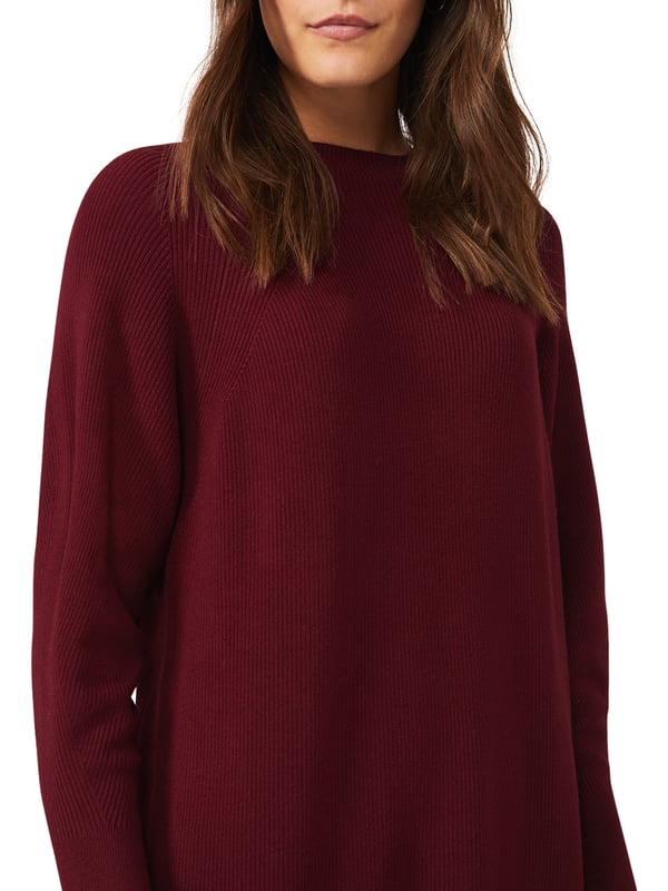 An effortless knitted tunic dress designed in an autumnal shade of port. Featuring a high neckline long sleeves and relaxed silhouette this flattering style looks great with skinny jeans and boots.