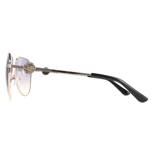 Guess Aviator Dames Gold Blue Gradient GF6140 GF6140 zijn een stijlvolle moderne vliegerstijl voor vrouwen met een uniek tempelontwerpontwerp dat deze geweldige zonnebril echt afzet.