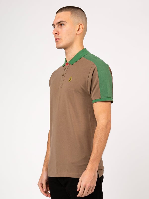 This polo shirt from LUKE is perfect for your everyday line-up. It's crafted from a soft cotton pique and detailed with contrast colour cut and sew overarm panels. It features a classic button placket which has a contrast colour underside and is complete with the brand's iconic lion head embroidery on the left chest. Iconic LUKE BLACK, GOLD, RED lion head embroidery. Iconic LUKE tri-colour trim tape. LUKE buttons. Contrast colour underside of collar. Rib collar and cuff. Single contrast cuff tipping. Contrast cut and sew overarm panels. Marina red top button..