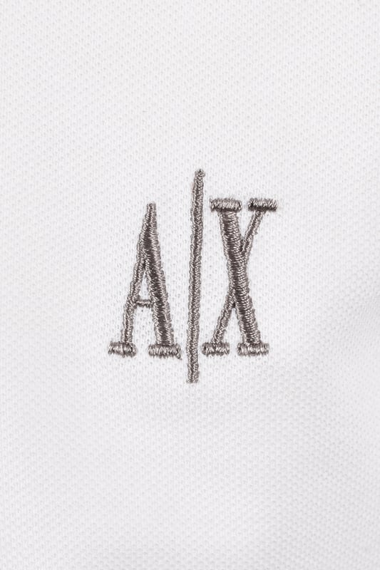 Armani Exchange Regular Polo Shirt in Off White
Enhance your casual wardrobe with the timeless sophistication of the Armani Exchange Regular Polo Shirt in a clean, off-white hue. This classic piece offers a refined yet relaxed style, perfect for everyday wear.
 
Features

Crafted from 100% soft and breathable cotton, ensuring exceptional comfort and durability.
Features a ribbed polo collar and ribbed cuffs on the short sleeves, providing a structured and polished look.
A three-button placket with branded buttons adds a touch of understated elegance. The signature Armani Exchange AX logo is meticulously embroidered in grey on the left chest, showcasing the brand's iconic style.
Regular Fit
Vented Hem
Style code: XM000367