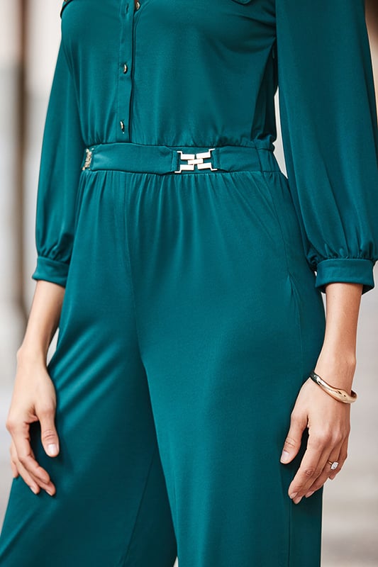 Make everyone green with envySlinky fabric drapes softly over your bodyCinched waist falls to flattering wide-legs Gold hardware and blouson sleeves up the luxe factor Style with ankle boots for the 9-5 Take it out-out with gold heels Inside leg to fit: Short 29" | Regular 31" | Long 33"
