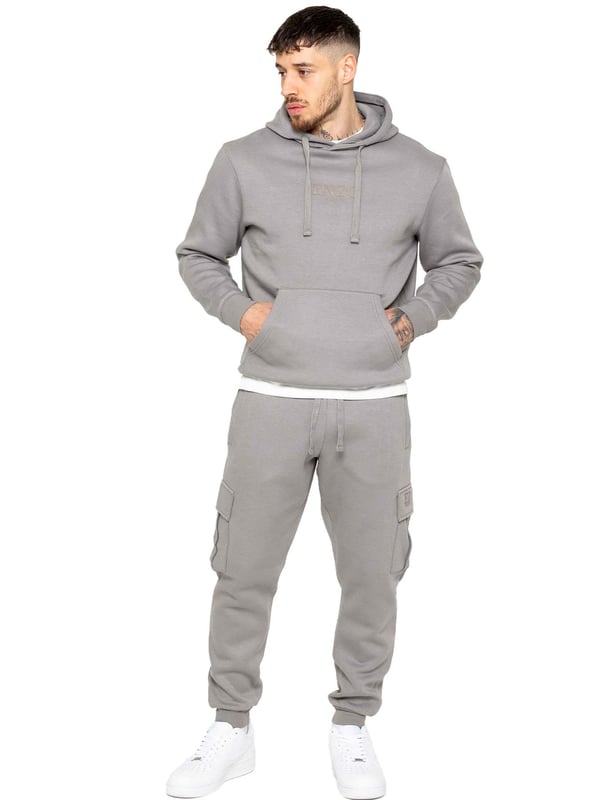 Enzo Mens Overhead Hoodie Tracksuit Set. Regular Fit, Long Sleeve Hoodie with Cuffed Wrists and Adjustable Drawstrings. Features EZ Logo On Chest And Joggers. Regular Fit Cargo Jogger. Elasticated Waistband With Adjustable Drawstring. Features 2 Side Slash Pockets, 2 Cargo Pockets, Single Welt Back Pocket. Ideal to use for Casual and Work wear.