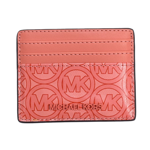 Tarjetero Michael Kors.
Forma rectangular.
Compartimentos para tarjetas o billetes plegados.
Ventana de identificación transparente.
Forro interior con estampado del nombre de la firma consecutivamente.
Costuras vistas a tono.
Aplicación del nombre de la marca.
Fabricado con cuidado y detalle, este tarjetero es el accesorio perfecto para cualquier mujer."
 Medidas: 10 cm (anch.) x 8 cm (alt.)
 Composición: 100% Cuero
 Cuidados:
Limpiar con un paño húmedo.