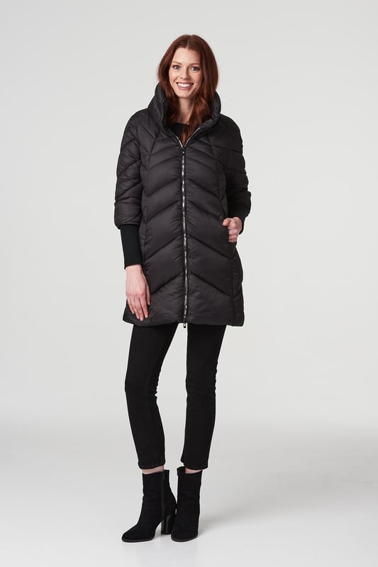 Keep warm but still on-trend with this sleek longline puffer coat. It has a high-necked collar, zip front, long sleeves with wide ribbed cuffs, handy pockets and a thigh length hem. Layer over almost any casual outfit for a practical style you can wear on repeat as it gets colder outside.