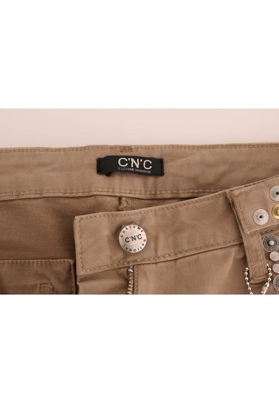 Precioso a estrenar con etiquetas.
  Vaqueros CoSTUME NATIONAL C'N'C 100% autenticos.
  Estilo de corte super ajustado.
  Color beige.
  Confeccionado con un 97 % de algodon y un 3 % de elastano.
  Cremallera y bragueta con boton.
  Detalles del logotipo.