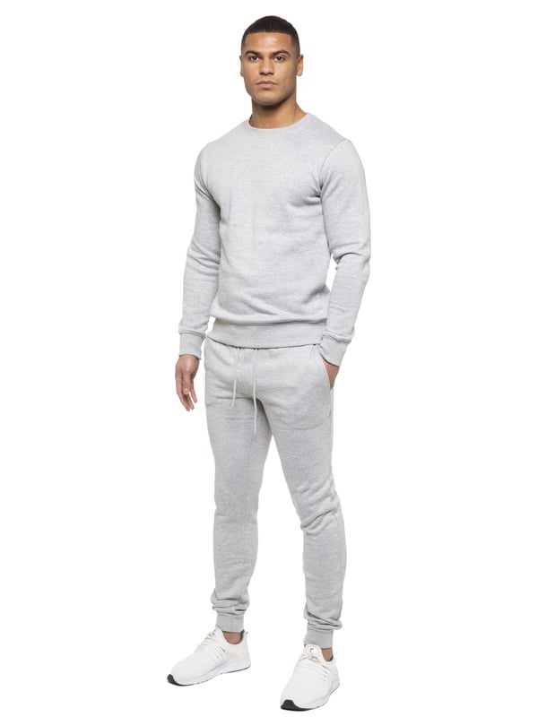 Kruze Mens Tracksuit set. Sweatshirt and Joggers set with 2 side Pockets, Drawstring, Ribbed Waist and Cuffs. Comfortable and Stylish. Inner lining of Brushed Back Fleece. Cotton Blend for Superior Quality. Crew Neck, Long Sleeves. Available in Black, Grey and Navy Colours. 52% Cotton, 48% Polyester. Machine Washable.