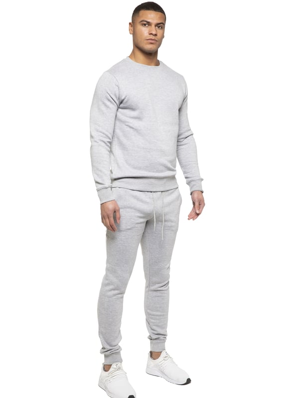 Kruze Mens Tracksuit set. Sweatshirt and Joggers set with 2 side Pockets, Drawstring, Ribbed Waist and Cuffs. Comfortable and Stylish. Inner lining of Brushed Back Fleece. Cotton Blend for Superior Quality. Crew Neck, Long Sleeves. Available in Black, Grey and Navy Colours. 52% Cotton, 48% Polyester. Machine Washable.