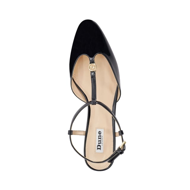 Our high shine patent Heya slingbacks feature an almond toe silhouette. The t-bar features our signature double D logo in gold hardware that matches the buckle on the adjustable ankle strap. Set on low block heel for ease of wear this chic and contemporary style is the perfect choice for day to evening wear.