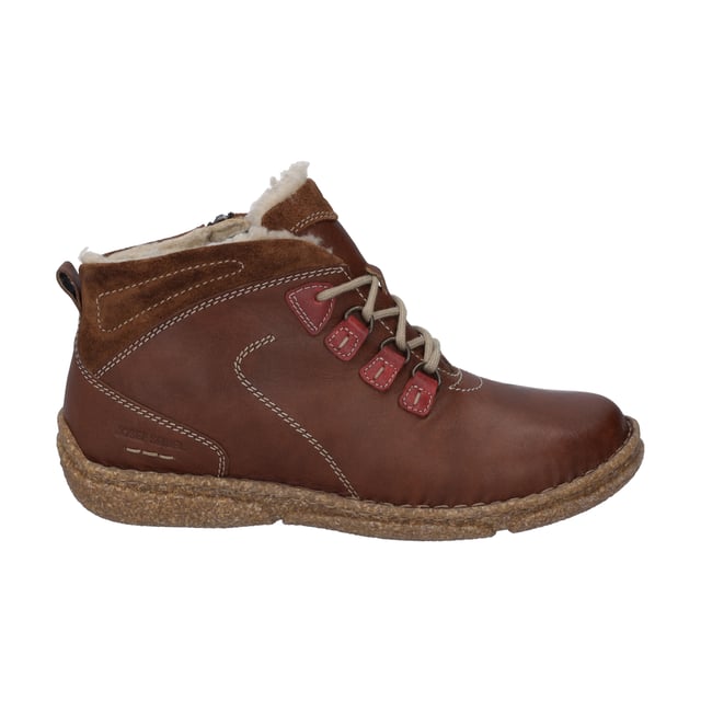 Herbst und Winter-Zeit ist Stiefeletten-Zeit. Genieße diese schöne Zeit im Jahr mit unserer braunen Damen-Stiefelette. Diese braune Stiefelette wird von uns aus einer geschmeidigen Leder-Kombination gefertigt. Die komfortable Schnürung gibt dem Fuß beim Gehen und Stehen besten Halt. Für die kalten Tage ist der Schuh mit hochwertigem Plüsch warm gefüttert. Die herausnehmbare Sohle kannst Du einfach wechseln. Die präzsie Handnaht zeichnet diese Stiefelette aus. Weite G ist die Komfortweite für alle normal gebauten Füße. Mit Neele 57 hast Du einen alltagstauglichen Begleiter für die Freizeit an Deiner Seite.