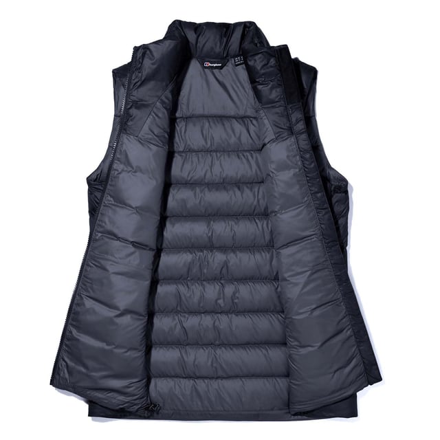 Womens Berghaus Silksworth Down Insulated Gilet in black. The weather has a funny way of testing even the simplest of adventurers  but don’t let old Jack Frost put you off from getting into the great outdoors. Packed full of Hydrodown®  this vest will see you through from a chilly hike to the school run. A perfectly versatile wardrobe staple  layer with a fleece when going on a hike— or even when popping out on your bike.- Made with more than 50% recycled content.- Main fabrics have been treated with a PFC free DWR (Durable Water Repellent) technology.- Fixed hood with stretch binding trim.- Full zip fastening with chin guard.- Sleeveless.- 2 zipped hand pockets and 1 zipped external chest pocket for extra storage.- Adjustable hem.- Berghaus logo printed at left chest. - Shell: 100% Polyamide.  Lining: 100% Polyamide.  Insulation: 80% Duck down  20% Duck Feather.  Machine washable. - Ref: 4A001670BP6