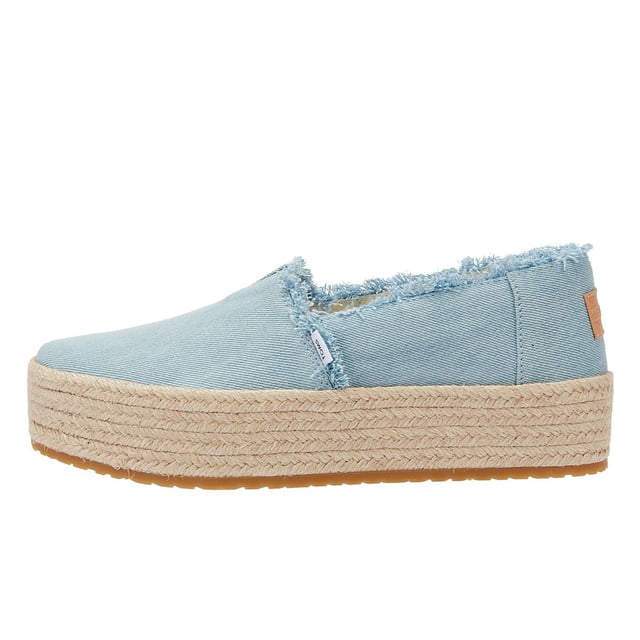 Elevate your style with these trendy espadrille platform slip-ons, featuring stylish textile uppers. The rope wrap platform adds a touch of sophistication to these shoes. Enjoy superior comfort with the padded heel that cushions your feet with every step. The OrthoLite Eco LT Hybrid insoles are made with 26% eco content, including 15% waste foam, 5% recycled materials, and 6% bio-oils, ensuring both comfort and sustainability. The rubber outsole offers excellent grip and durability. With an outsole height of approximately 1.5 inches, these slip-ons provide the perfect amount of elevation. Rest assured, these shoes are completely vegan, catering to your ethical choices. Step out in style and comfort with our exceptional espadrille platform slip-ons.
