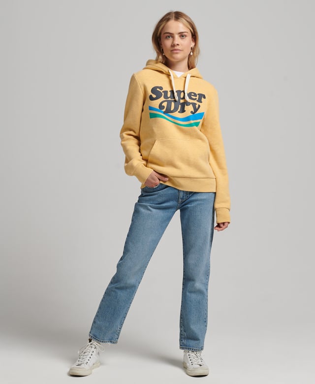 Superdry Vintage Cooper Nostalgia Hoodie Our Vintage Cooper Nostalgia Hoodie brings a playful nature to your wardrobe. Retro-inspired graphics pay a loving homage to iconic designs, and effortlessly turn your casual out into a statement. With brushed lining and ribbed trims, these hoodies embody that trusted Superdry quality and are sure to keep you cosy.Relaxed fit – the classic Superdry fit. Not too slim, not too loose, just right. Go for your normal sizeDrawstring hoodLarge front pocketRibbed cuffs and hemBrushed liningSuperdry patch