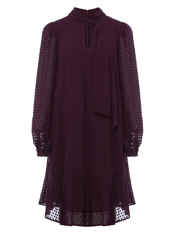 Elevate your wardrobe with the luxurious Everly Swing Dress - a textured piece in a rich plum shade perfect for any casual occasion.