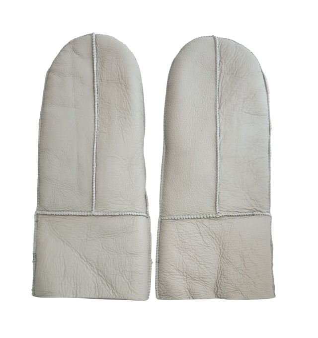 Experience luxurious warmth and timeless elegance with Infinity’s Womens Super Soft Sheepskin Mittens. Crafted from premium quality sheepskin, these mittens provide unmatched softness and comfort, wrapping your hands in cozy warmth. The refined stitch detailing adds a subtle touch of sophistication, making them a versatile accessory for any occasion.
Available in a range of classic colours, these mittens seamlessly complement your wardrobe and enhance your style. With multiple sizes to choose from, you’ll find the perfect fit for ultimate comfort and flexibility. Blending traditional craftsmanship with modern functionality, Infinity’s Unisex Super Soft Sheepskin mittens ensure both protection and style, so you can step out confidently, knowing you're wearing the finest quality gloves.
Sizing and Fit
These mittens may feel snug initially, but with a few hours of wear, the lambskin will naturally stretch and conform to your unique fit.