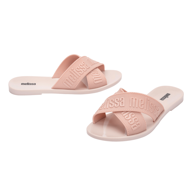 Join the multistrap trend with the Melissa M Lover Slide, the ticket to becoming a footwear icon! Lightweight and available in a variety of delightful colors, the sandal is inspired by the current fashion scene and features the unmistakable Melissa charm. Grab the perfect pair, pronto!