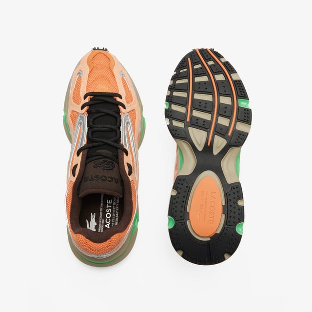 The L003 2K24 is the step to the future of Lacoste sneaker design language. This sneaker is built for today’s fashion-sneaker connoisseur - harnessing sport  style and tech features for a fresh and unique design aesthetic. The sporty mesh upper is layered with suede and multiple embossed metallic leather panels  harnessed by an outer cage which features the Lacoste Active branding details. The light EVA midsole features a dynamic shiny TPU stabiliser for support and stability together with a textured rubber outsole. • Progressive Running Sneaker • Breathable Mesh Upper with Synthetic overlays • Synthetic metallic panels with embossed detailing • Outer Synthetic Leather Cage design printed with Active Branding • EVA midsole with TPU support • Textured rubber outsole • Rounded rope laces • Mesh lining