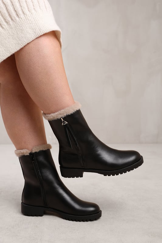 Mid calf boots with fur top
