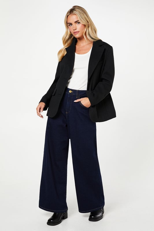Sophisticated herringbone stripe pattern
        Versatile blazer-coat hybrid design
        Tailored fit with structured shoulders
        Front button closure for a polished look
        Functional front pockets for practicality
    
    This Dorothy Perkins Petite Herringbone Stripe Blazer Coat is the epitome of smart-casual chic. Perfect for the fashion-forward woman who values both style and comfort, this versatile piece effortlessly bridges the gap between a blazer and a coat. The herringbone stripe pattern adds a touch of sophistication, making it ideal for a variety of occasions, from brunch with friends to baby showers. Style it over a crisp white top and wide-leg trousers for a refined look that's sure to turn heads. The tailored fit flatters the figure while maintaining a professional appearance, ideal for those smart-casual events where you want to make an impression without overdoing it. This blazer coat is a wardrobe essential that will quickly become your go-to piece for adding a polished finish to any outfit.