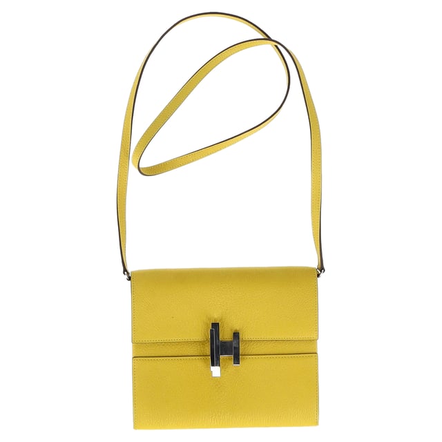 VINTAGE, RRP AS NEW
Brighten up your wardrobe with the Hermes Cinhetic To Go Shoulder Bag in stunning yellow leather. This eye-catching bag is the perfect accessory to add a pop of color to any outfit. Style it with a floral maxi dress and sandals for a fun and vibrant summer look that exudes elegance and sophistication. The versatile design and spacious interior make it a practical and stylish choice for everyday wear, while the luxurious leather adds a touch of luxury to your ensemble.

Hermes Cinhetic To Go Shoulder Bag in Yellow Leather
Condition: Excellent
Signs of wear: No retail tag, No visible sign of wear., 
Packaging: None
Color: Yellow 
Material: Leather | leather
Size: One Size | One Size
Measurements: Width: 20; Height: 160; Length: 185
SKU: NAPPUGBBA419119W