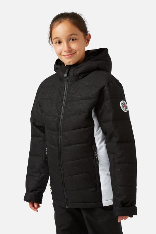 The Disco Girls ski jacket is a durable premium ski jacket, fully teched up for all conditions. Regular fit and length with baffled construction make this great all-rounder. Plenty of features to keep you happy and comfortable all day up the mountain or simply on the way to school.

    Fit: Regular Fit
    Shell Fabric: 100% Recycled Polyester Ripstop.
    Waterproof Rating: 10,000 mmor simply put the fabric will sustain 10 meters of water pressure onto the face of the shell.
    Breathability Rating: High Breathability - 10,000 g/m2This level of breathability will allow the heat generated from your body to escape without allowing condensation to build up and make you wet from the inside.
    Treatments: Hydrophobic Durable Waterproof Repellent finish (DWR) Is applied to the outer shell to make the jacket highly water and stain resistant. You will see water bead and roll off the outer shell to help stop the fabric becoming saturated and wetting out.
    Insulation: 100% recycled low loft polyester 80 grams in the body and 40 grams in the arms.

    Feature List
    Taped seams
    Internal zipped pocket with goggle wipe
    Fixed hood
    Wrist guard
    Super soft chin guard
    Lift pass stash pocket
    Chunky main zipper
    Powder skirt
    Dry butt patch
    Internal/External storm flaps
    Multiple zipped pockets
    Machine washable