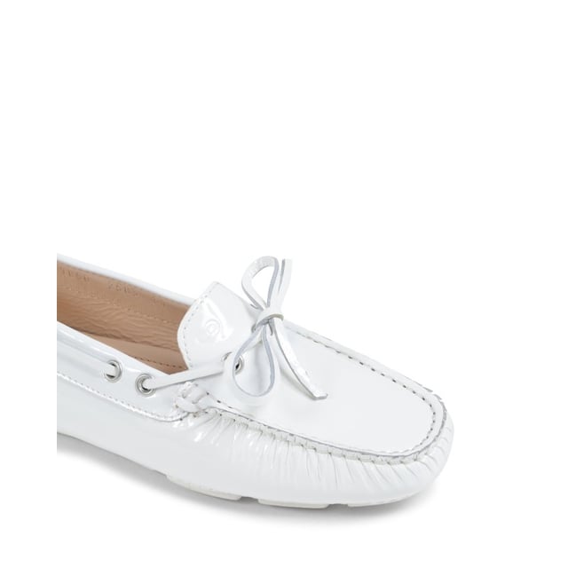 Elegant Lady Loafer The Dee Elegant Lady Loafer in white is the epitome of class. Made in Italy by some of the countries finest craftsmen, this shoe is 100% patent leather and features a rubber sole and bow detail. Made in Italy 100% Leather 100% Rubber Sole