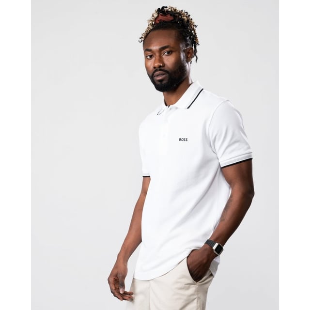 A signature polo shirt by BOSS Menswear, cut to a regular fit. Featuring contrast tipping and a logo at the left chest, this short-sleeved polo shirt is designed in cotton piqué and detailed with further BOSS branding at the undercollar.
Regular fit. Flat-knit collar. Number of buttons: 3. Short sleeves. Flat-knit cuffs. Standard length. 100% Cotton.
50469055
Model is 5"8 and wears size M
