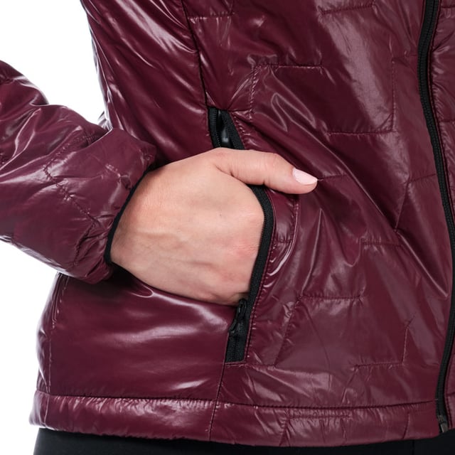 Womens Helly Hansen Lifaloft Insulator Jacket in wild rose. <BR><BR>Versatile lightweight padded jacket  ideal layered under a shell or as a stand alone jacket. <BR>- Quilted design.<BR>- LIFALOFT™ insulation keeps you warm with less weight and bulk  even when wet.<BR>- Funnel neck.<BR>- Full zip fastening with inner storm placket.<BR>- Long sleeves with elasticated cuffs.<BR>- Zipped hand warmer pockets to front  lined with Polartec® fleece for extra warmth.<BR>- Bungee drawcord adjustment at inner hem.<BR>- Helly Hansen brand tab at left chest. <BR>- Measurement from shoulder to hem: 22in approximately. <BR>- Shell: 100% Polyamide. Lining: 100% Polyamide.  Insulation: 100% Polyester. Machine washable. <BR>- Ref: 65625-662<BR><BR>Measurements are intended for guidance only.