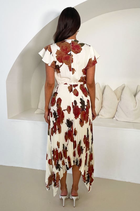 Our Cream Floral Print Wrap Top Asymmetrical Hem Pleated Midi
Dress is the perfect occasion dress. It's soft fabric and pleated
skirt make this dress feel extra luxurious. Featuring a wrap over top,
flutter sleeves, a pleated midi skirt with a zig zag hem and a zip up
back. Team it with some cute heels to complete the look!

Model wears: UK 8/ EU 36/ US 4
Model's height: 168cm/ 5'6"
Approx length from centre back to hem: 135 cm
Fabric composition: 100% Polyester
Colour: CREAM

*print position may vary*