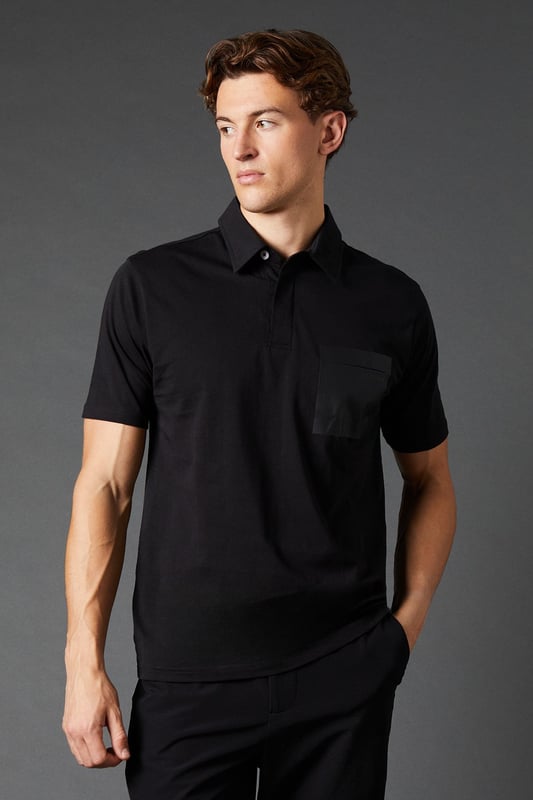Classic polo silhouette with a modern twist
        Contrasting chest pocket adds visual interest
        Mercerised fabric for a subtle sheen and durability
        Short sleeves and collar for a smart-casual look
        Part of the exclusive Burton 1904 collection
    
    This 1904 Contrast Pocket Mercerised Polo from Burton seamlessly blends timeless style with contemporary details. Perfect for the discerning gent who appreciates subtle sophistication, this polo shirt is a versatile addition to any wardrobe. The contrasting chest pocket adds a touch of intrigue to the classic design, while the mercerised fabric ensures a luxurious feel and enhanced longevity. Ideal for casual outings or relaxed weekends, pair it with dark wash jeans and trainers for a pub lunch with mates. For a smarter look, team it with chinos and loafers for family gatherings or casual Fridays at the office. The polo's adaptable nature makes it a go-to choice for various occasions, from watching sports at home to impromptu garden parties. Embrace the effortless style of Burton's 1904 collection and make this polo a staple in your everyday rotation.